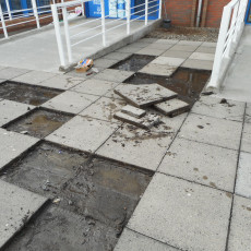 C & S Home Services NI Ltd laying paving slabs